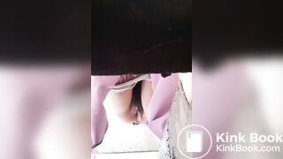 A woman struggling with a thick one