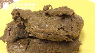 Shaved babe shits on yellow plate..