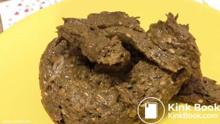 Shaved babe shits on yellow plate..