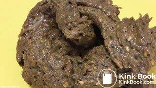 Shaved babe shits on yellow plate..