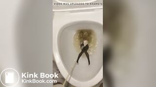 piss anime figure in public toilet