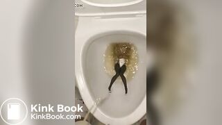 piss anime figure in public toilet