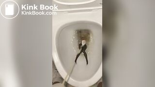 piss anime figure in public toilet