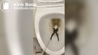 piss anime figure in public toilet