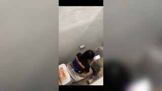 Thai womam pooping in toilet