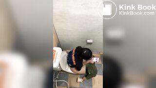 Thai womam pooping in toilet