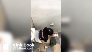 Thai womam pooping in toilet