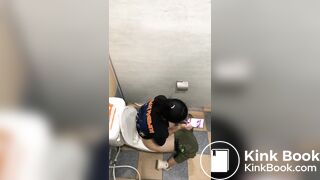 Thai womam pooping in toilet