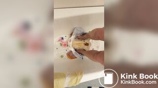 Slave daddy pees over his dirty diaper