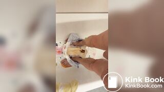 Slave daddy pees over his dirty diaper