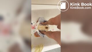 Slave daddy pees over his dirty diaper