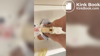 Slave daddy pees over his dirty diaper