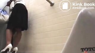 Girl shitting in squat public toilet - video 2
