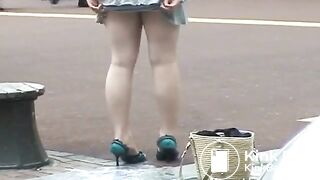 Asian girls poop squatting in front of a man 2