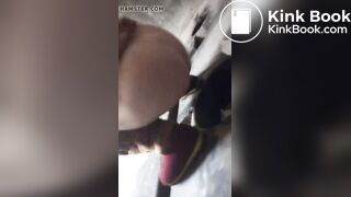 woman with a gorgeous ass shitting in a toilet built on the street