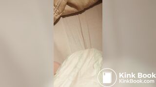 Babygirl loading her nappy