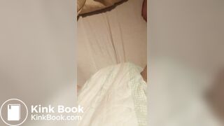 Babygirl loading her nappy