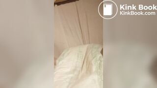 Babygirl loading her nappy