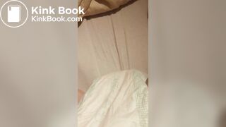 Babygirl loading her nappy