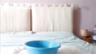 on the bed where she always gets fucked , she plays with her shit
