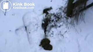 Woman shitting in snow