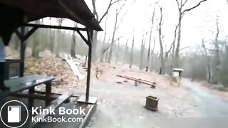 girl shit in rainy weather outdoors and her friend takes pictures on camera