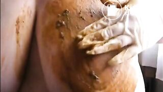 Mature bbw smearing shit on her huge tits