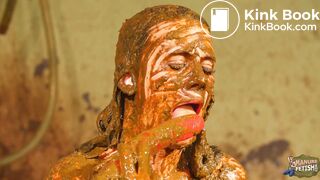 Betty licks the cowshit covered dildo