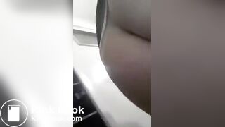 Young girl taking a shit and showing her holes