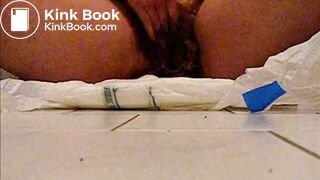 Girl poops diaper and plays