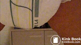 Girl poops diaper and plays