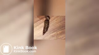 Pretty ebony shitting