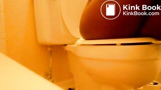 Ebony Girl pooping in toilet