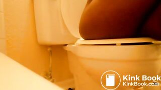 Ebony Girl pooping in toilet