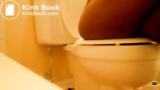 Ebony Girl pooping in toilet