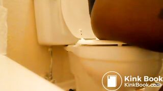 Ebony Girl pooping in toilet
