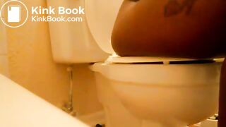 Ebony Girl pooping in toilet
