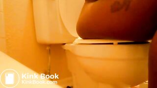 Ebony Girl pooping in toilet
