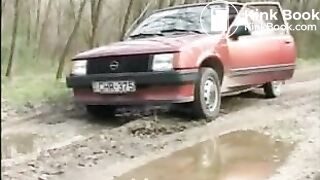 Girl pooping on the side of the road after parking her car