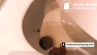 Sexy girl shit in toilet