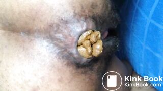 Black hairy pussy letting out fat monster turd