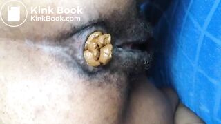 Black hairy pussy letting out fat monster turd