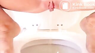 Pretty redhead teen pees and poops for camera