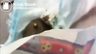 Giantess - girl shitting on lego figure in diaper