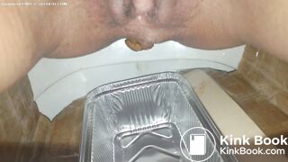 Huge turd into plastic container