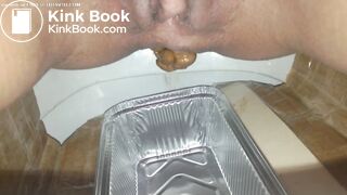 Huge turd into plastic container