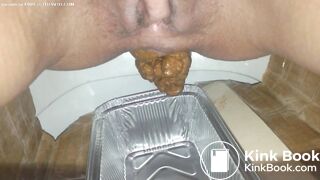 Huge turd into plastic container