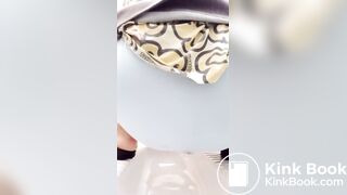 Shitting in panty in public toilet