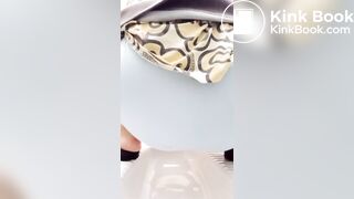 Shitting in panty in public toilet