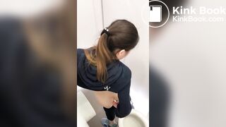 cute asian girl pooping in the toilet